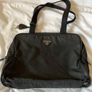 Prada nylon purse black bought at designer resale store. In good used condition.